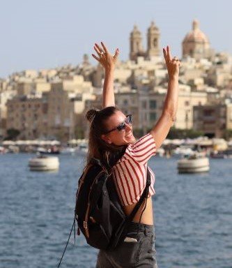 young-woman-traveling-in-malta-2023-11-27-05-22-15-utc-1